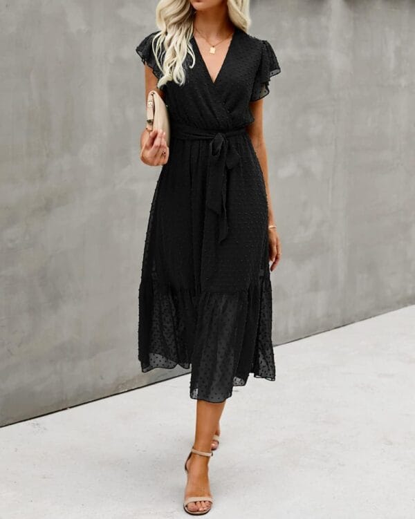 Women's white floral wrap midi dress with ruffle hem front view