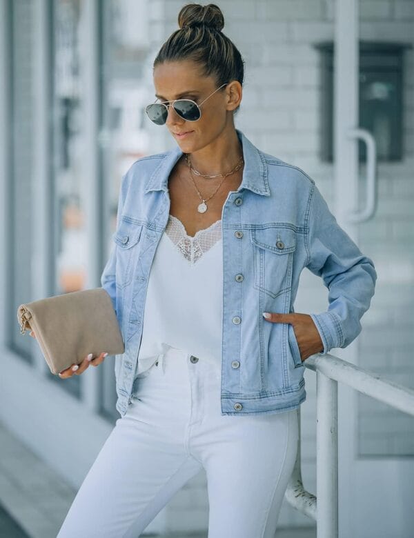 Fitted long sleeve women's denim jacket in light blue color