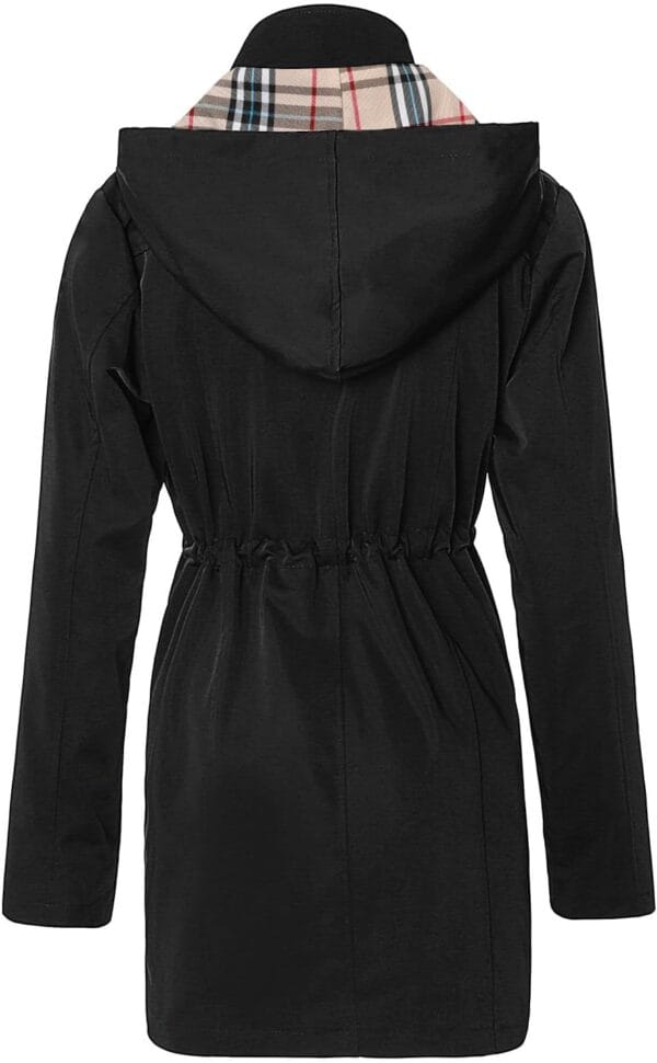 Best women's waterproof rain jacket in vibrant blue, showcasing hood and zip pockets