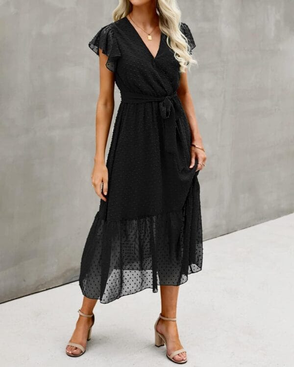 Women's floral wrap dress with white ruffle hem, front view