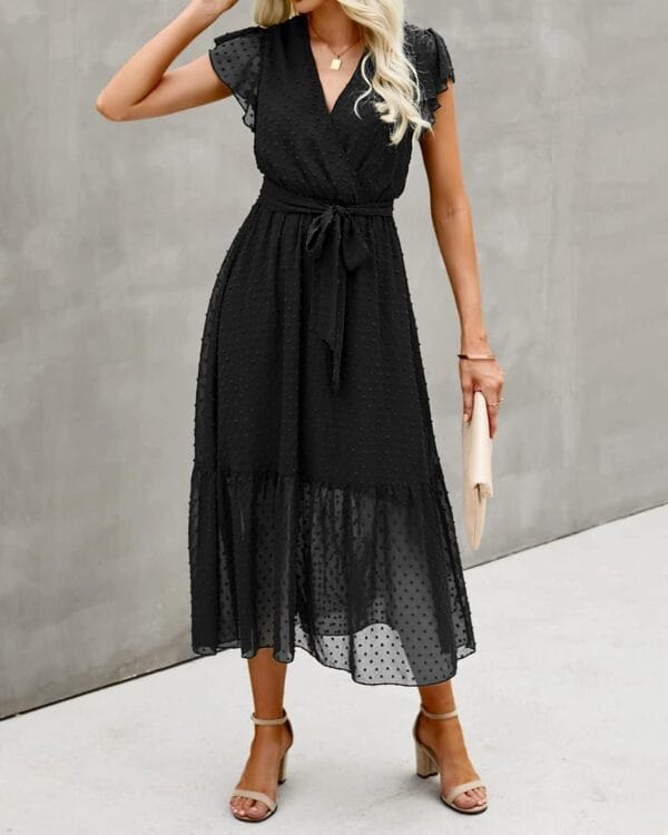 White floral wrap midi dress with ruffle hem viewed from the front