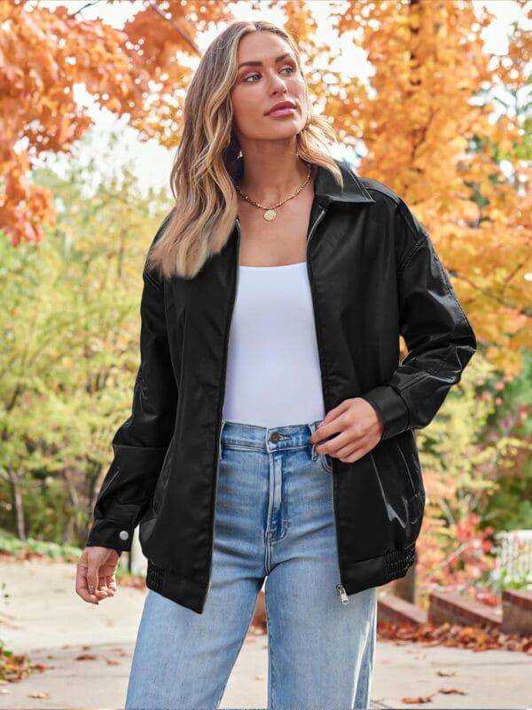 Women's oversized faux suede leather jacket displayed on a hanger