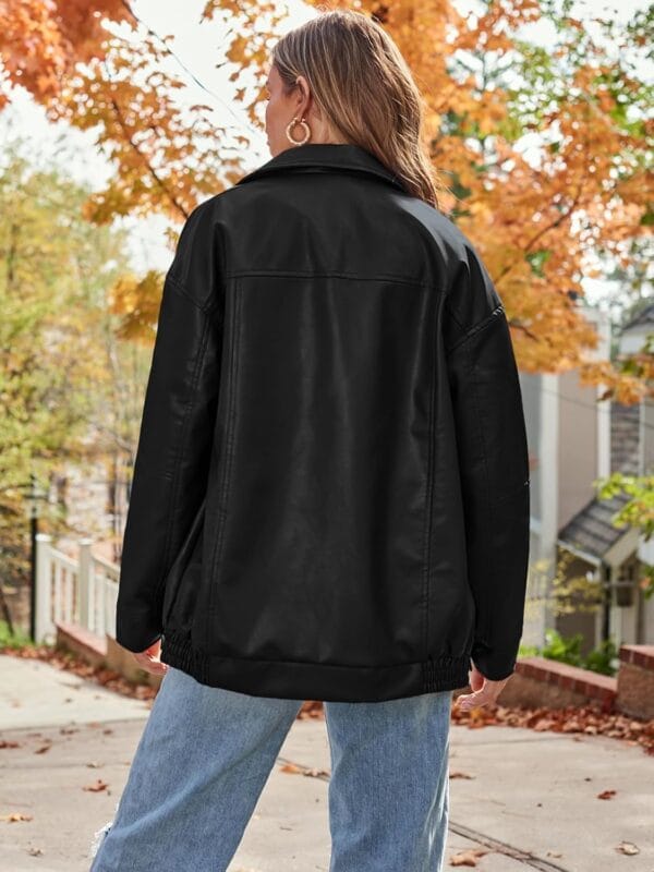 Women's oversized faux suede leather jacket in tan, model posed front view
