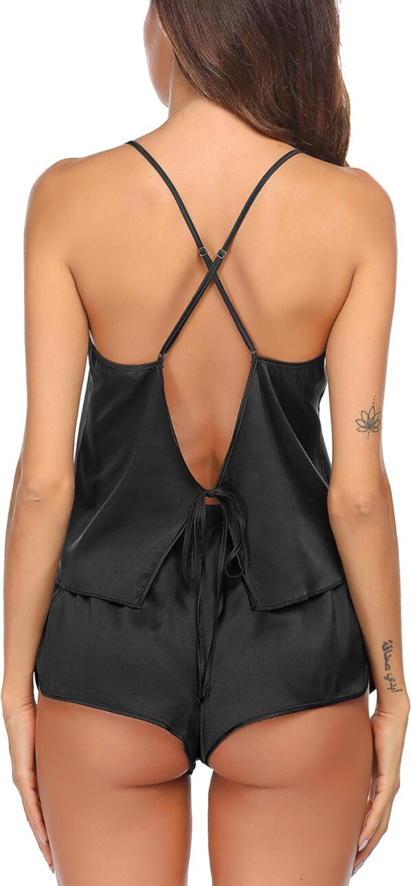 Elegant women's silk pajama set featuring a satin cami and shorts