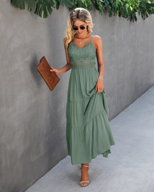 Women's crochet lace maxi dress in white, side view for summer beach outings