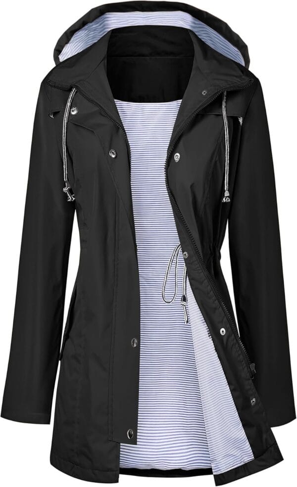 Women's long waterproof trench coat with hood displayed front view