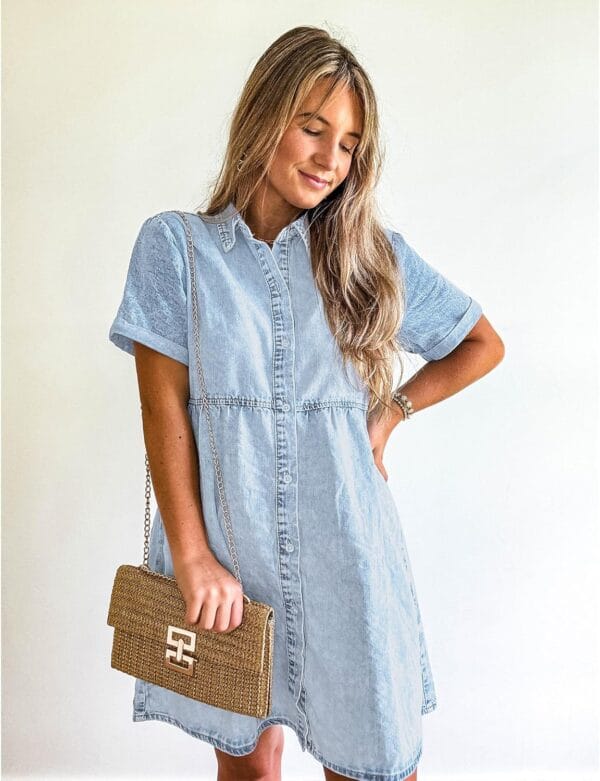Women's short sleeve denim dress with tiered design and button down front