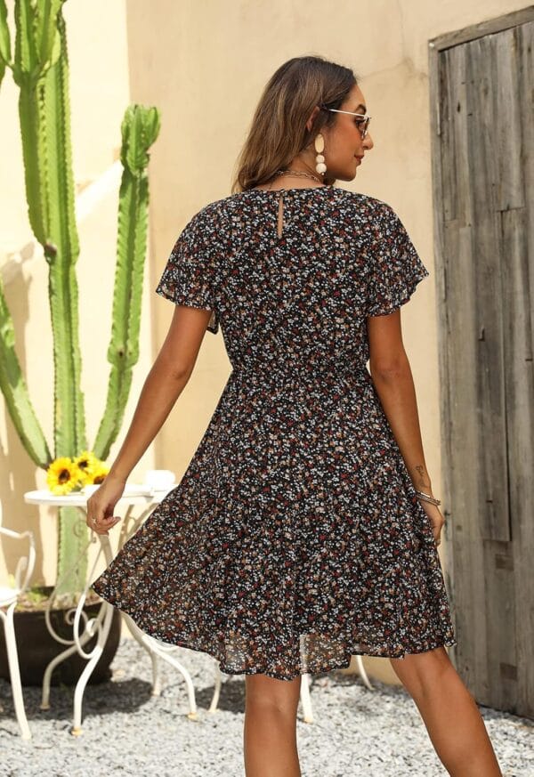 Women's casual summer skater dress with bohemian floral print and flutter sleeves