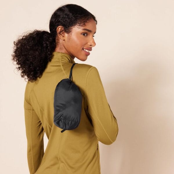 Women's lightweight long sleeve packable puffer jacket in navy blue