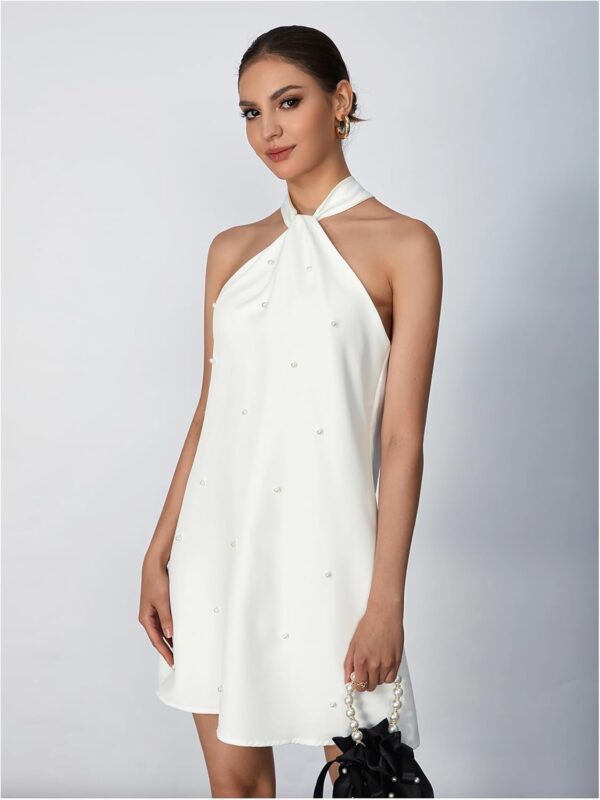 Elegant women's halter neck cocktail dress with beaded details