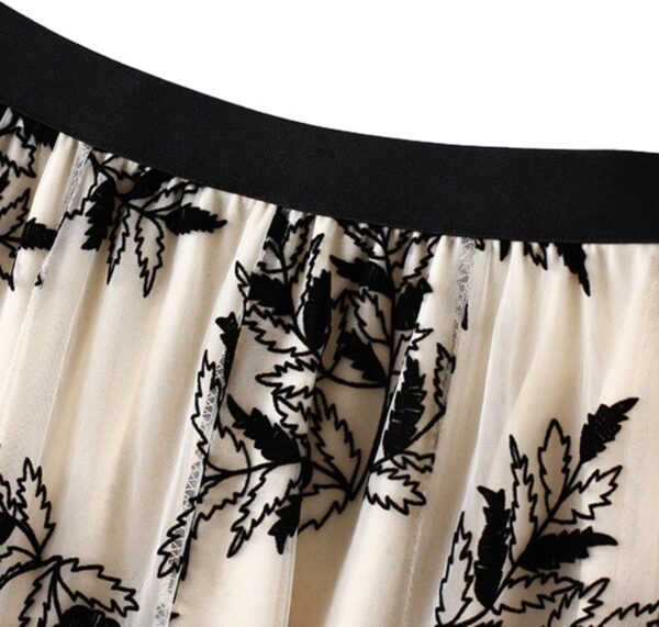 Women's A-Line fairy patterned midi skirt with elastic waist and ruffles