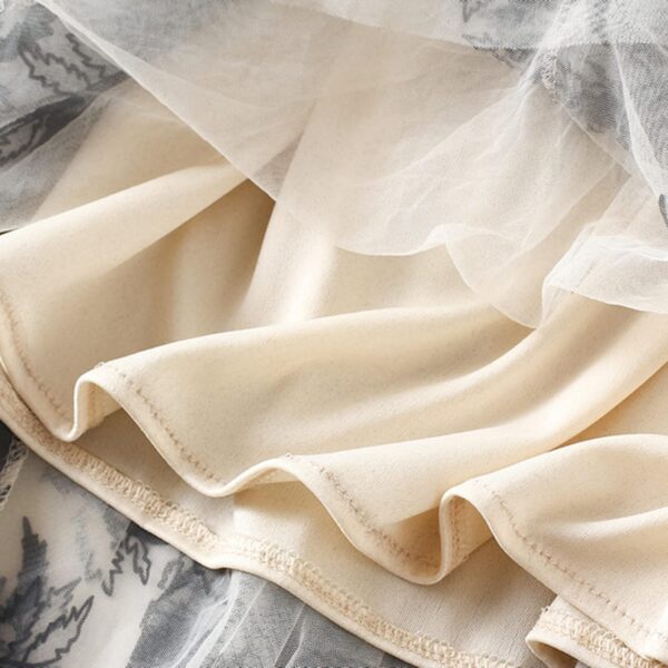 Women's A-line midi skirt with fairy patterns and ruffle details