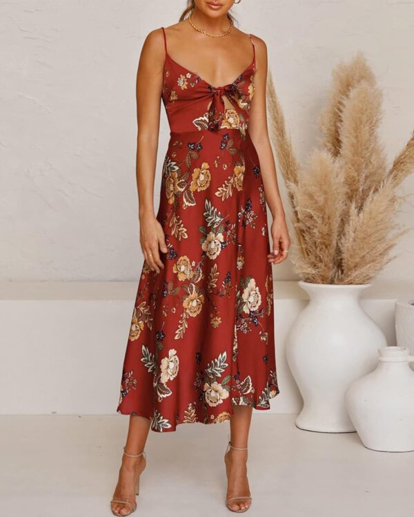 Women's satin midi dress in backless style with spaghetti straps