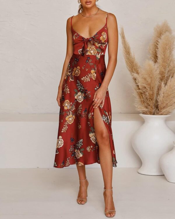Women's satin midi dress featuring spaghetti straps and backless design