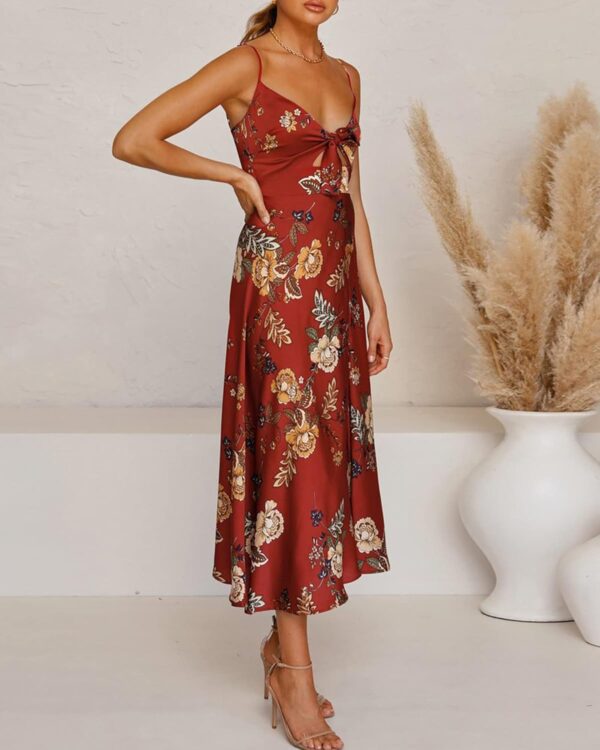 Women's satin midi dress with spaghetti straps and backless design