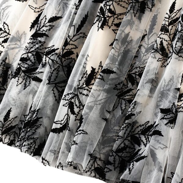 Women's A-line midi skirt with a floral fairy pattern and ruffle design