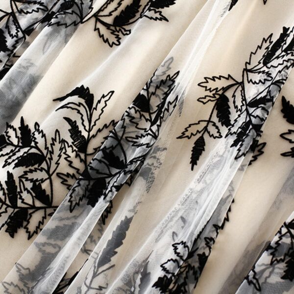 Women's A-Line midi skirt with fairy patterns and ruffle design